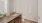 a bathroom with a marble countertop a sink and a toilet