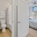 a bathroom and bedroom entryway