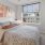 a bedroom with a large window