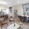 a large kitchen with a dining table and chairs