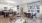 a large kitchen with a dining table and chairs