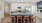 a kitchen with an island bar and stools
