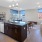 a large kitchen with a large island and many windows