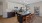a kitchen with a bar island
