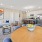 a living room with a dining table and chairs