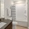 a bathroom with a tub toilet and sink